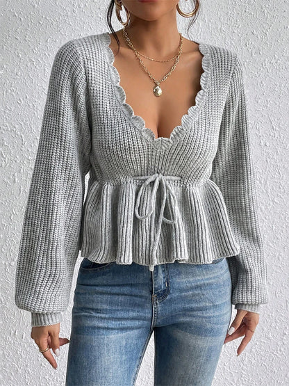 "RuffleVibe" Chic Ribbed V-Neck Peplum Sweater