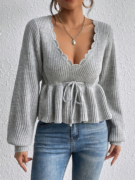 "RuffleVibe" Chic Ribbed V-Neck Peplum Sweater