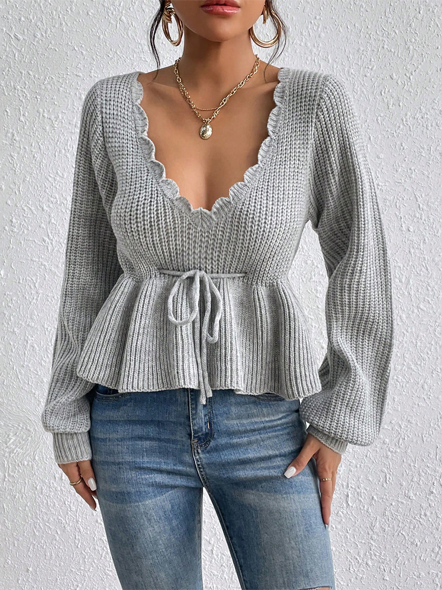 "RuffleVibe" Chic Ribbed V-Neck Peplum Sweater