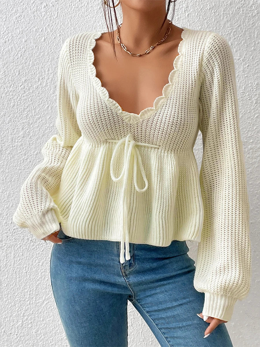 "RuffleVibe" Chic Ribbed V-Neck Peplum Sweater